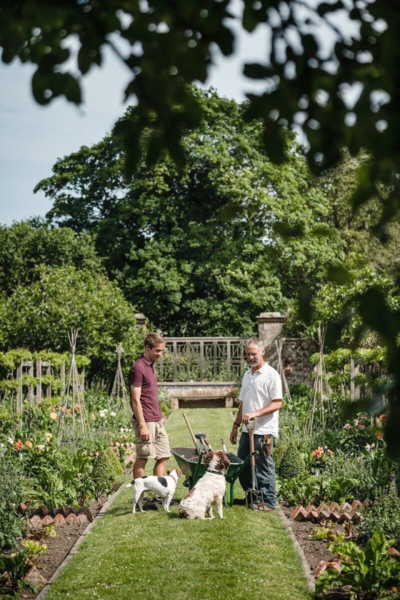 fittleworth house West Sussex gardening team with dogs