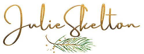 logo of Julie Skelton with pine needles garden photography