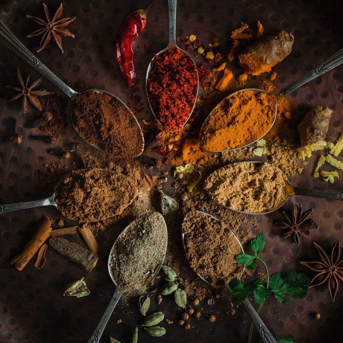 ground and whole spices for Mandira's Kitchen food photography Surrey