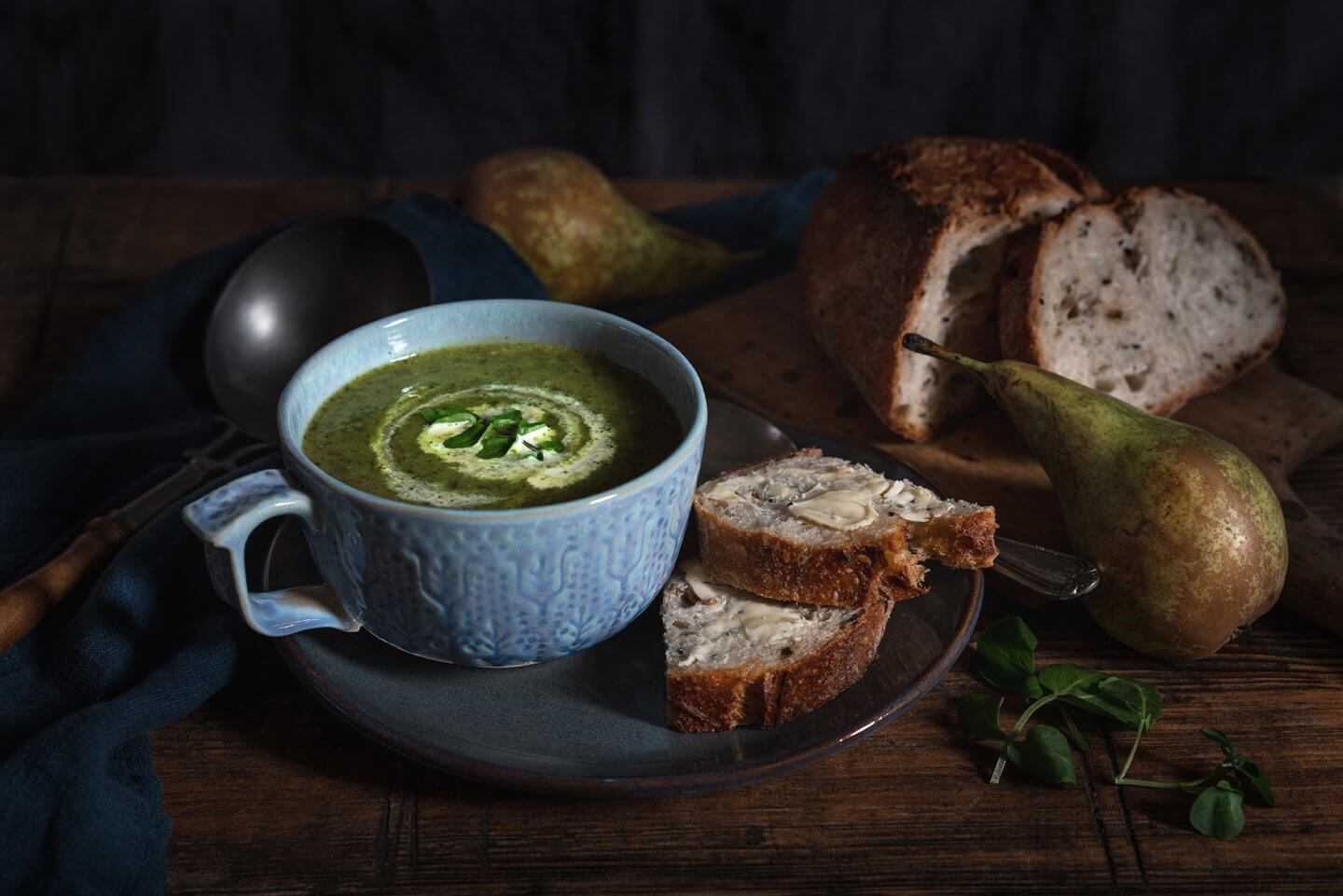 watercress and pear soup with rustic bread food photography