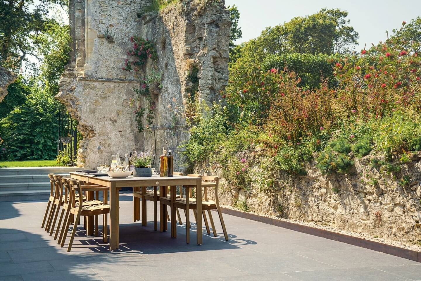 summer eating outdoor dining wooden handcrafted furniture in English country garden
