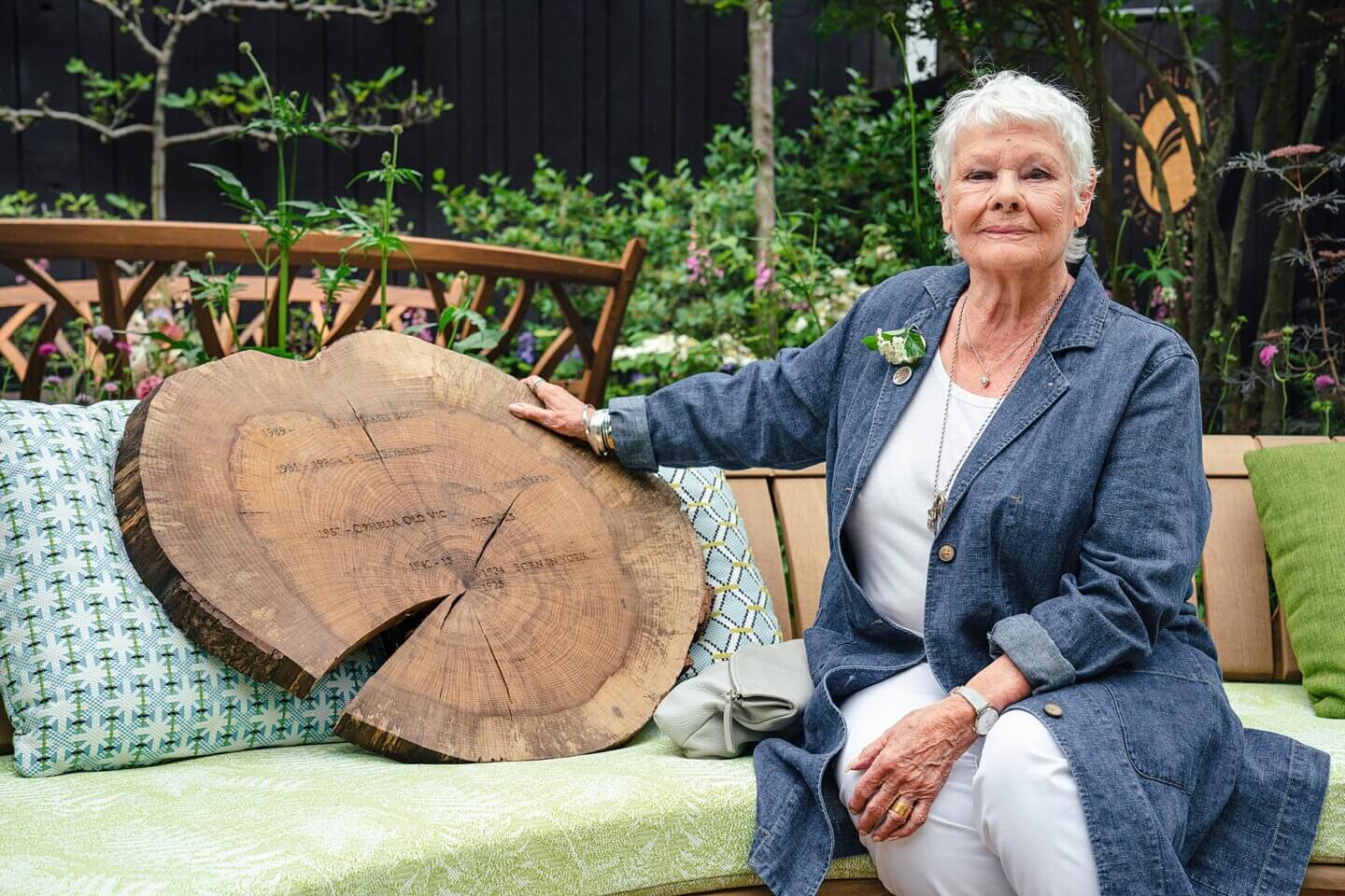 Dame Judi Dench with a slice of Herefordshire oak engraved with significant life dates