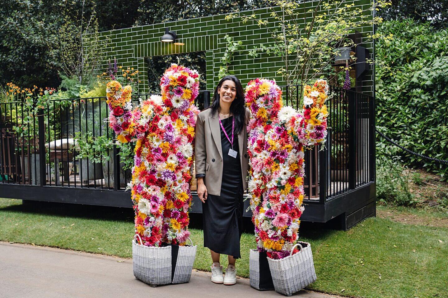 Emma Tamsin Tipping garden designer in front of her balcony garden at RHS Chelsea