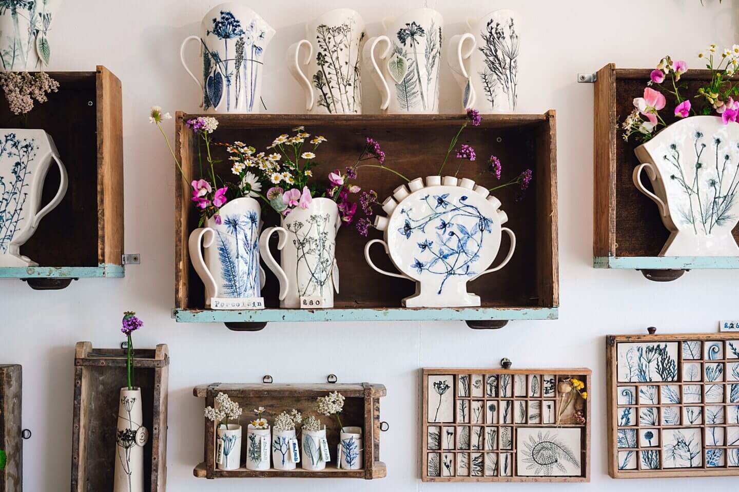 Vases and pots using ceramics to imprint flowers